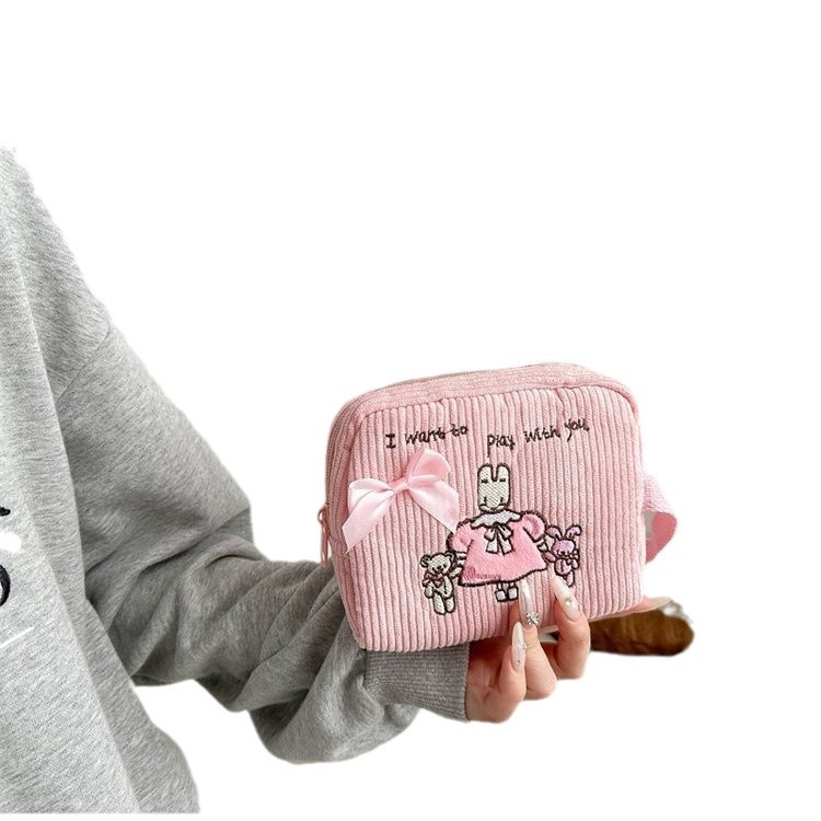 Wholesale Sanrio Kuromi coin purges, portable keys, storage handbags, cartoon fabric cosmetic bags for women Item Picture