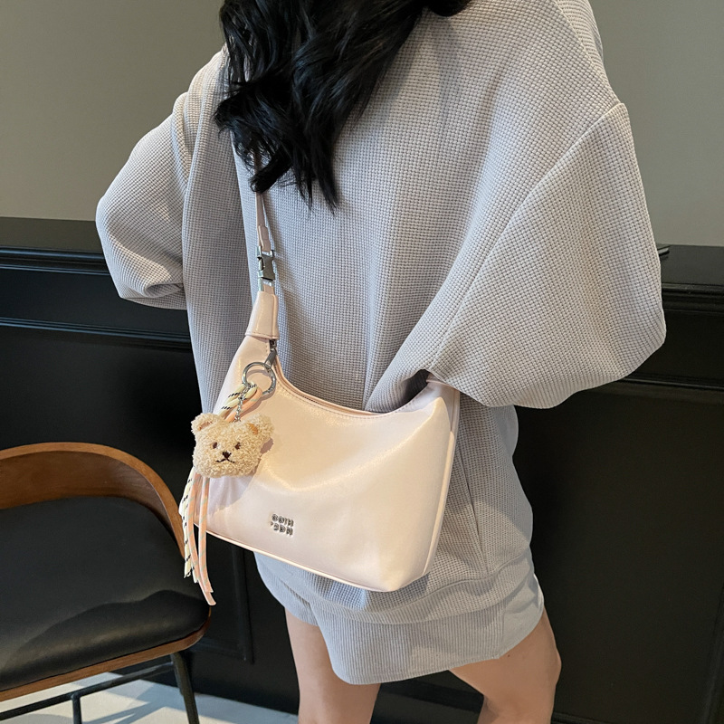 Light luxury and simple hand-held small bag for women, 2025 new Korean-style fashionable single-shoulder underarm bag, niche crossbody crescent bag details Picture