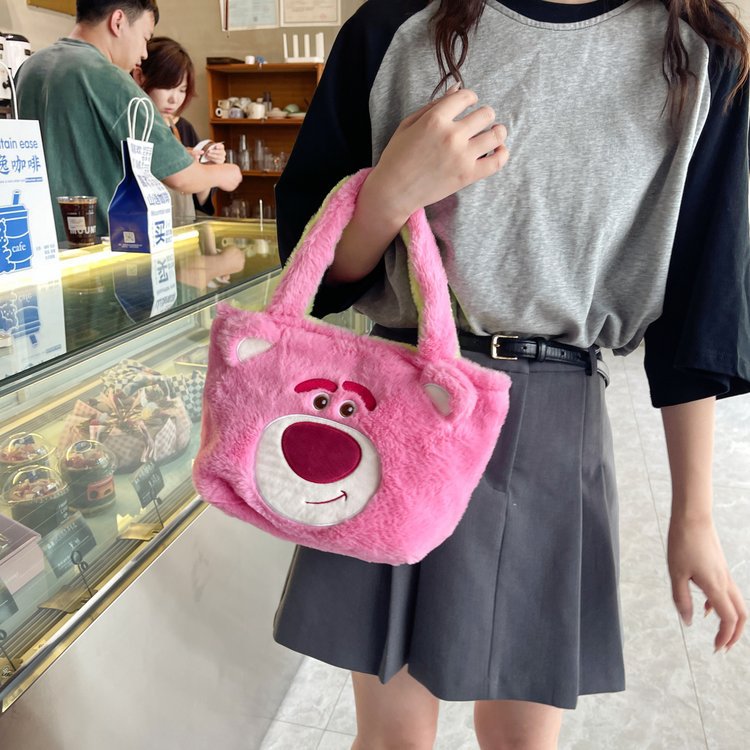 The new plush bag for women, the double-bread bag, the soft-hearted cosmetic bag, the handbag, the strawberry bear, and the three-eyed monster cartoon bag Application Scenario