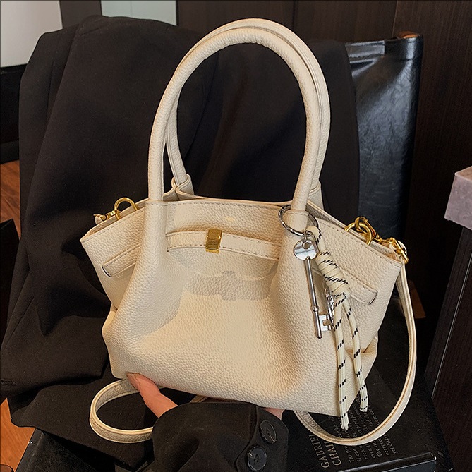 Cross-border niche pleated retro tote bag for women, 2025 new style, high-end commuting single-shoulder crossbody bag full figure