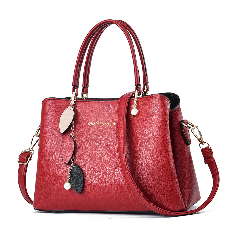 The 2025 new style of ladies' hand-held handbag is elegant, fashionable and stylish. The large-capacity single-shoulder bag for mothers is simple and fashionable Item Picture