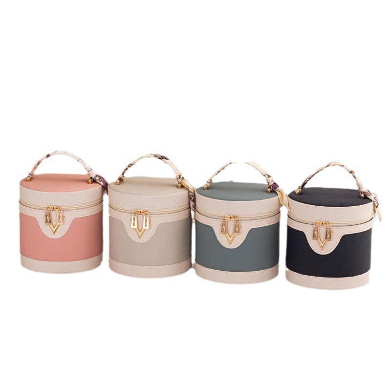 Lychee-patterned bucket cosmetic bag, large capacity, high appearance level, portable pu cosmetic case, multi-functional waterproof hand-held Item Picture