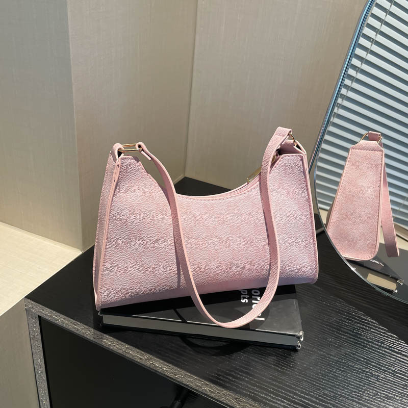 The new trendy and simple women's bag with contrasting colors will be launched in the autumn of 2024. It's a Korean-style fashionable and stylish single-shoulder hand-carry underarm bag full figure