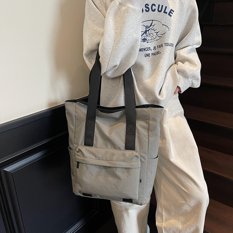 Large-capacity casual and simple single-shoulder bag, a hand-held cloth bag for college students to attend classes, a commuting bag for work, and a storage bag for tablet computers Specification drawing