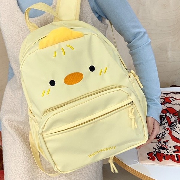 The new winter version of the "Crying Black Cat" backpack, schoolbag, emoticon character, little yellow duck pain bag is detachable and has a large capacity for classes full figure