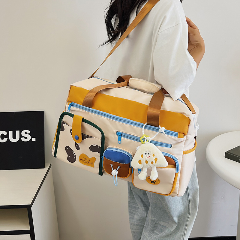 Korean version large-capacity short travel bag, cute girl back-to-school season luggage storage bag, large-capacity lightweight fitness bag Specification drawing