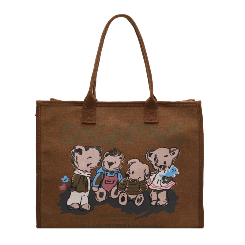 Autumn and winter retro large-capacity canvas bag for women, 2024 new trendy and fashionable cartoon handbag, commuter single-shoulder tote bag Item Picture