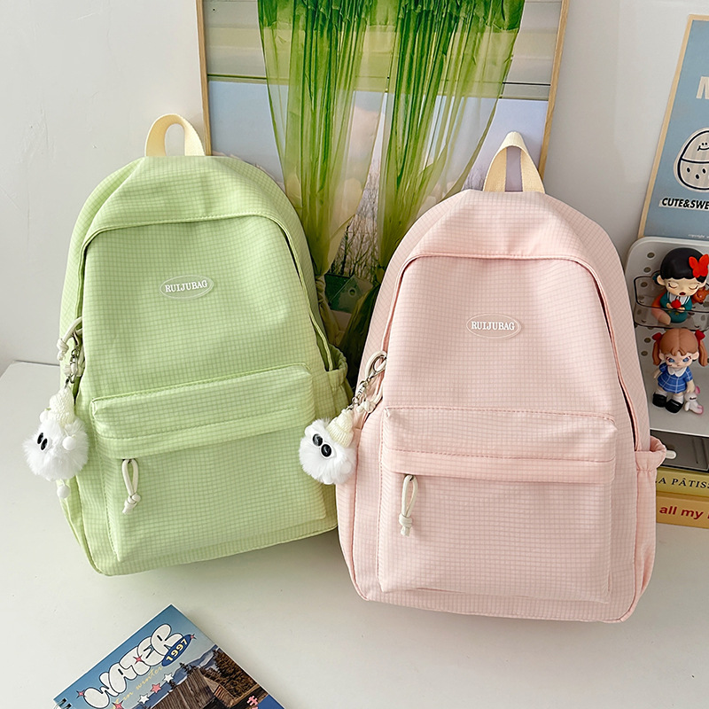 A new, simple and solid color backpack that goes well with all kinds of outfits. A Korean-style casual bag for teenage girls, students and college students on Instagram with a high level of appearance full figure