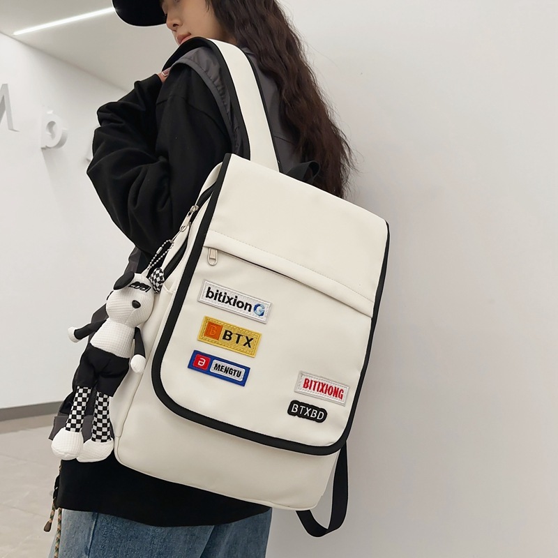The trend of large-capacity backpacks for female college students, high school students, junior high school students and primary school students in the cross-border Korean version Specification drawing