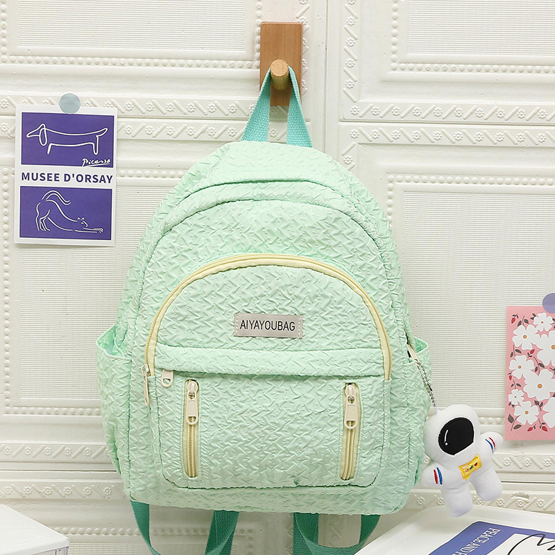 New types of travel and study bags for primary school students, simple backpacks for girls, travel backpacks for kindergartens, and travel and study bags full figure