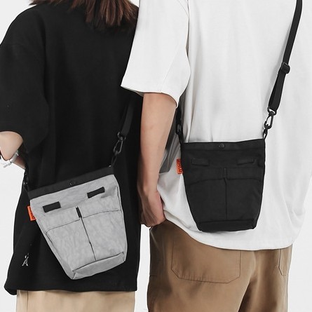Simple fabric small bag for women, 2025 new style Japanese and Korean trendy nylon vertical phone bag, casual and versatile crossbody bag Application Scenario