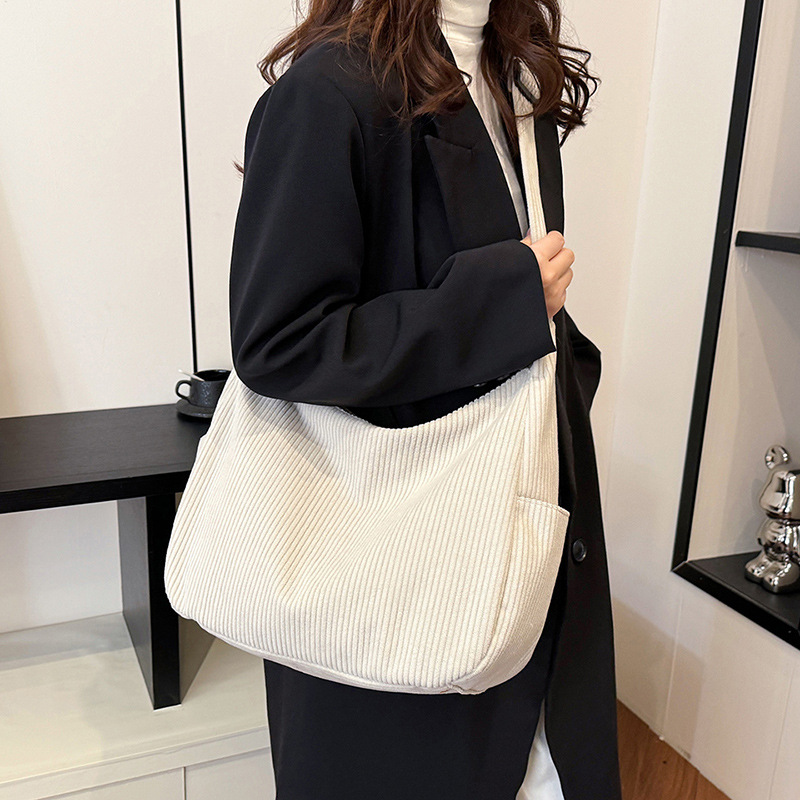 Large-capacity corduroy tote bag for women, new autumn and winter solid color versatile casual crossbody bag, commuting single-shoulder bag, fabric bag full figure