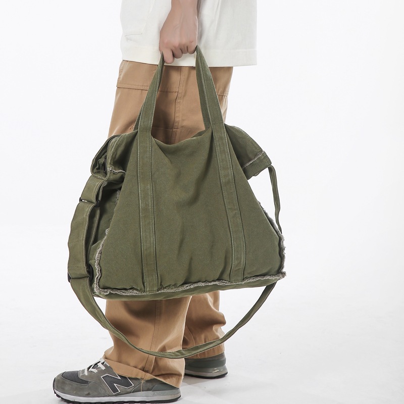 Japanese single-shoulder bags for men and women, 2024 new style, with unique fringed canvas bags, hand-held crossbody bags, and ins student messenger bags details Picture