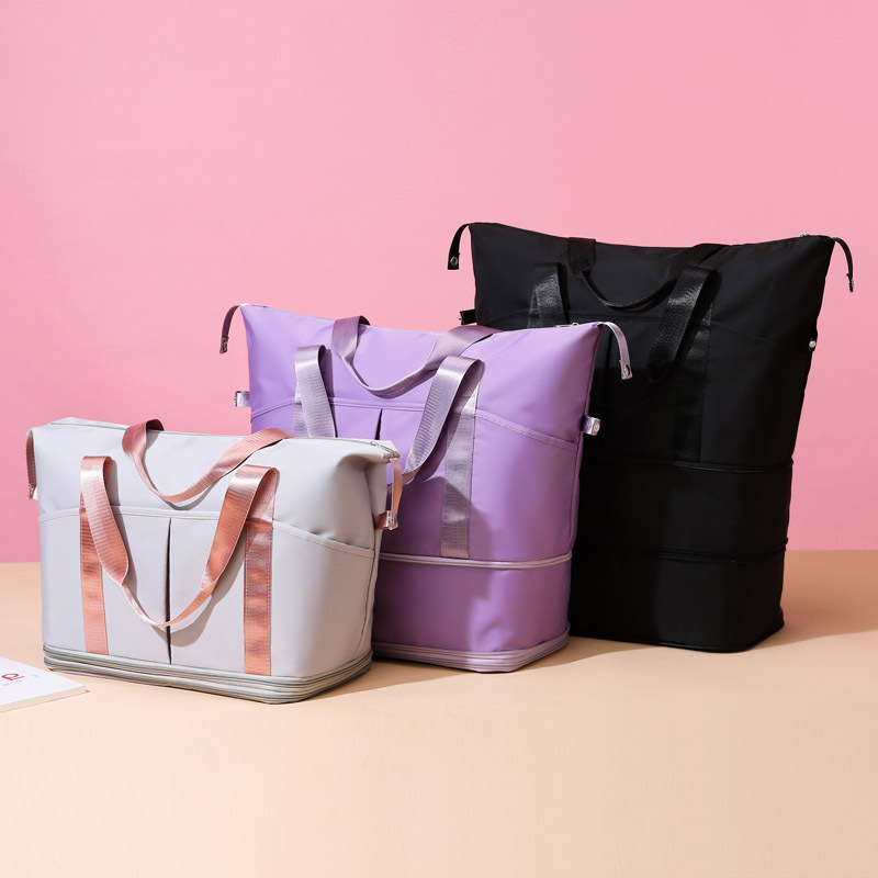 Wholesale of new travel bags, large-capacity women's hand-held business trip storage bags, portable maternity sports and fitness bags, and luggage bags full figure