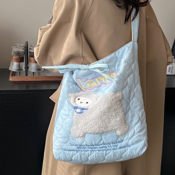 Korean-style cute embroidered pattern drawstring single-shoulder bag, simple and versatile, adjustable crossbody bag, school-style commuting bag full figure
