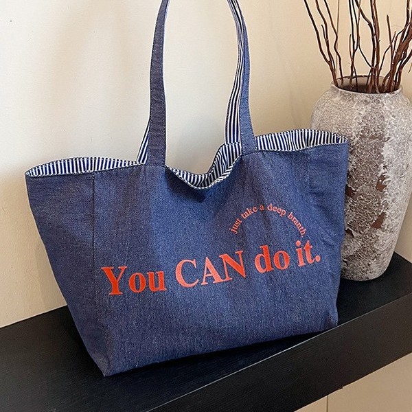 A new large-capacity tote double-sided striped casual single-shoulder textured lettered canvas bag for student commuting from South Korea full figure