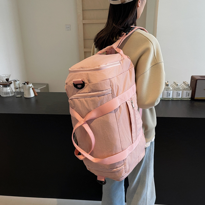 Foldable hand-held travel bag, lightweight and multi-functional double-back sports and fitness bag, dry and wet separation case, trolley luggage bag Application Scenario