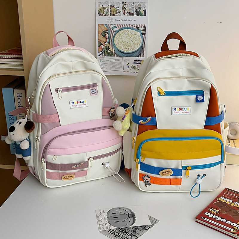 The schoolbag is in an InS-style Korean style with contrasting colors. It's a large-capacity backpack for junior high school students, simple and trendy. It's a relaxing backpack that reduces the burden on students full figure