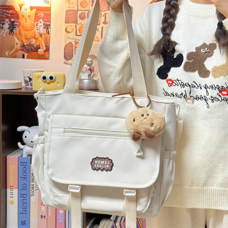 Fashionable new lightweight single-shoulder bag, solid color underarm bag for women, college style large-capacity tutorial bag, student handbag details Picture