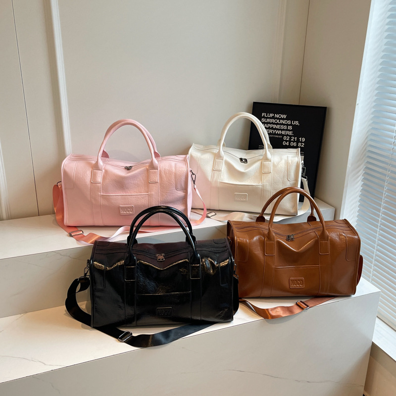 New cross-border business travel bags, large-capacity student accommodation luggage bags, men's and women's soft leather-like sports and fitness bags details Picture