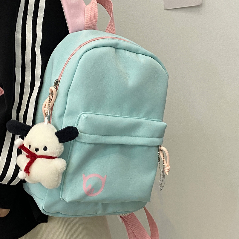Simple and casual, for primary school, junior high school and college students, this Korean-style color-blocking, fresh and light backpack is lightweight and has a large capacity Application Scenario