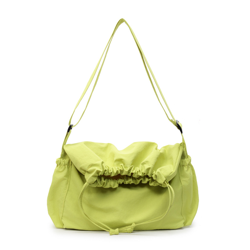 Couple style drawstring crossbody bag, large capacity folding messenger bag, unisex wandering bag, solid color casual single-shoulder bag Item Picture