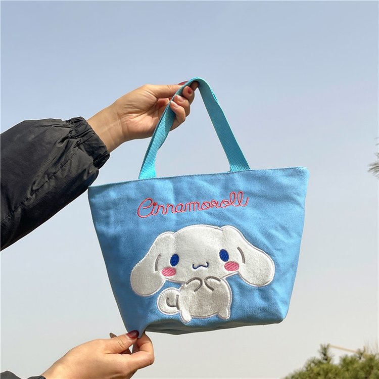 Cross-border wholesale claw machine, Kuromi strawberry bear canvas bag, hand-held cosmetic bag, lunch box, plush toy manufacturer details Picture