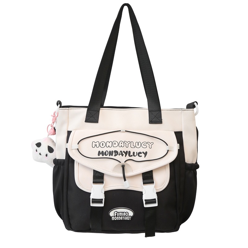 High appearance level Korean-style fresh and simple single-shoulder bag for junior high school students, color-blocking handbag, primary school student tutorial bag, canvas crossbody bag Item Picture
