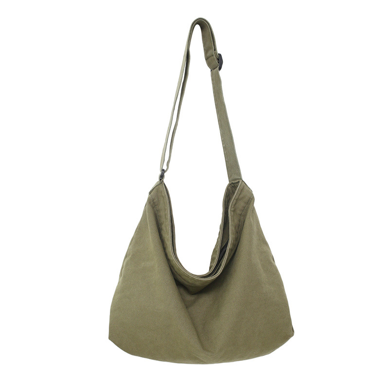 Order a new Japanese streetwear single-shoulder bag for women, a laid-back style solid color muji retro washed canvas bag Item Picture