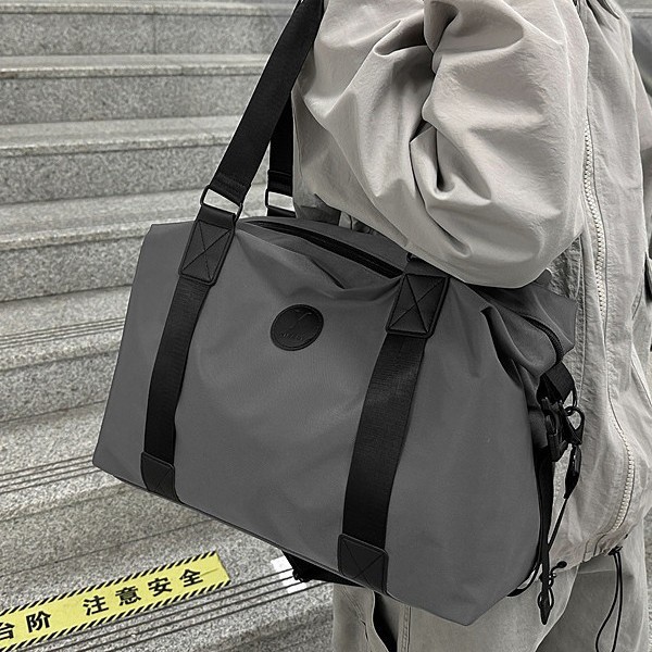 New autumn and winter fabric hand-held shoulder storage bag, simple and fashionable travel bag, dry and wet separation sports and fitness bag full figure