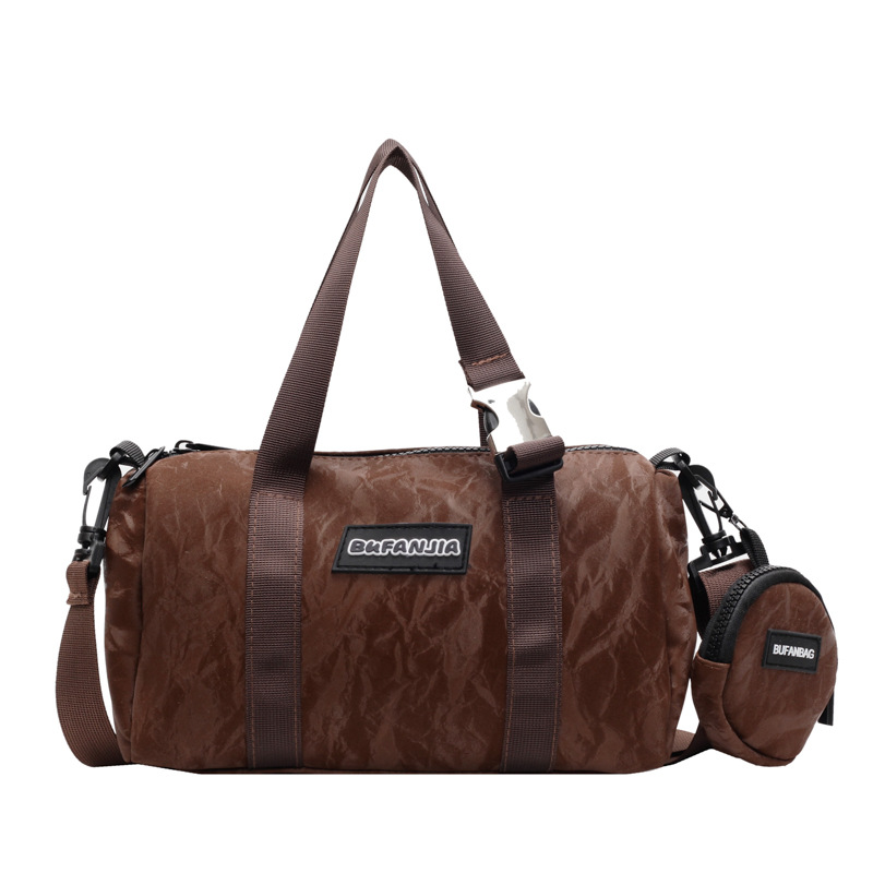 Large-capacity women's autumn and winter retro 2024 new style fashionable single-shoulder crossbody bag, versatile hand-carry commuting cylinder bag Item Picture