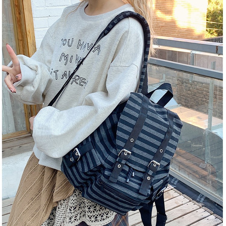 2024 New student schoolbag, Korean niche style retro striped backpack, large-capacity casual backpack Application Scenario