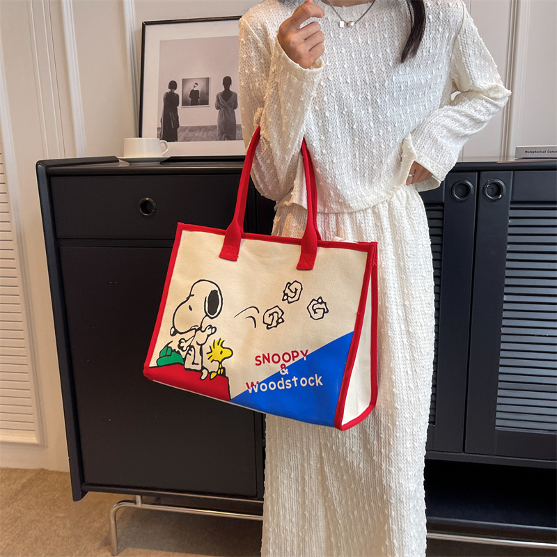 New cartoon-printed canvas large-capacity tote bag for girls, ins hand-carry bag for commuting, shopping and going out details Picture