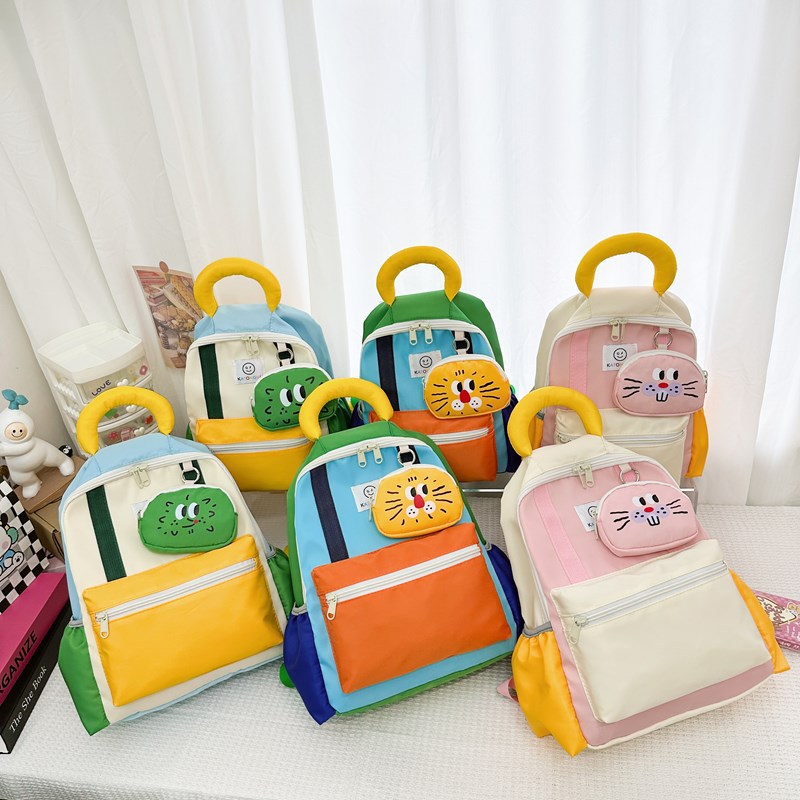 Cross-border kindergarten cartoon color-blocking backpacks for boys, lightweight and cute primary school students, and girls for spring outings full figure