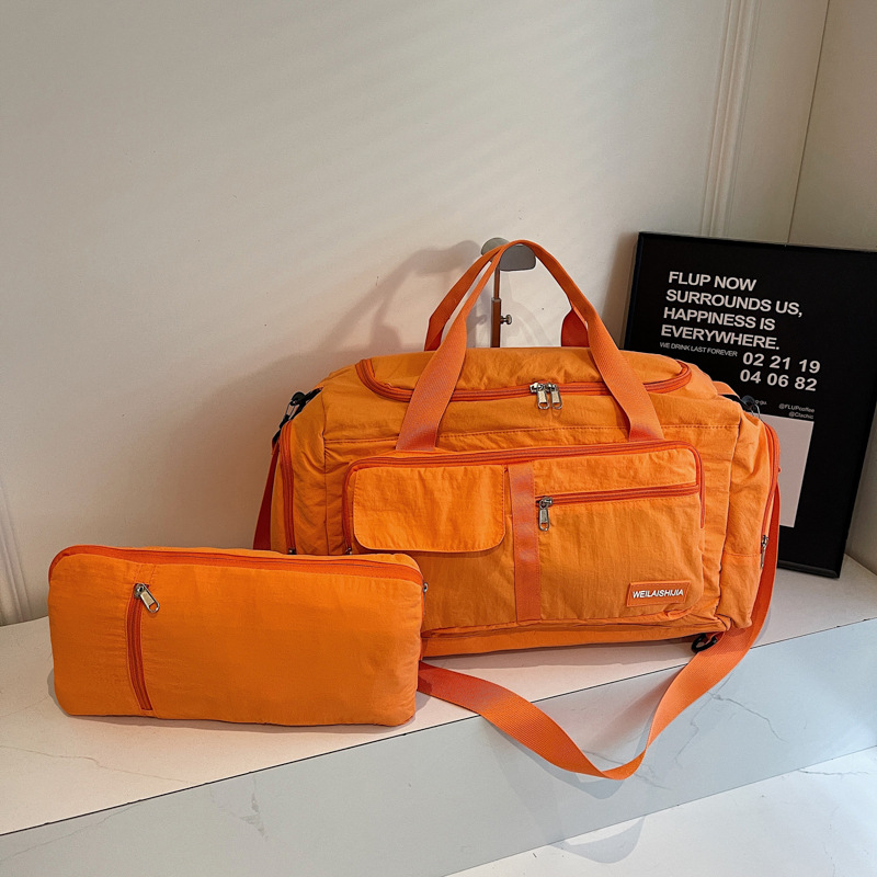 Foldable hand-held travel bag, lightweight and multi-functional double-back sports and fitness bag, dry and wet separation case, trolley luggage bag full figure