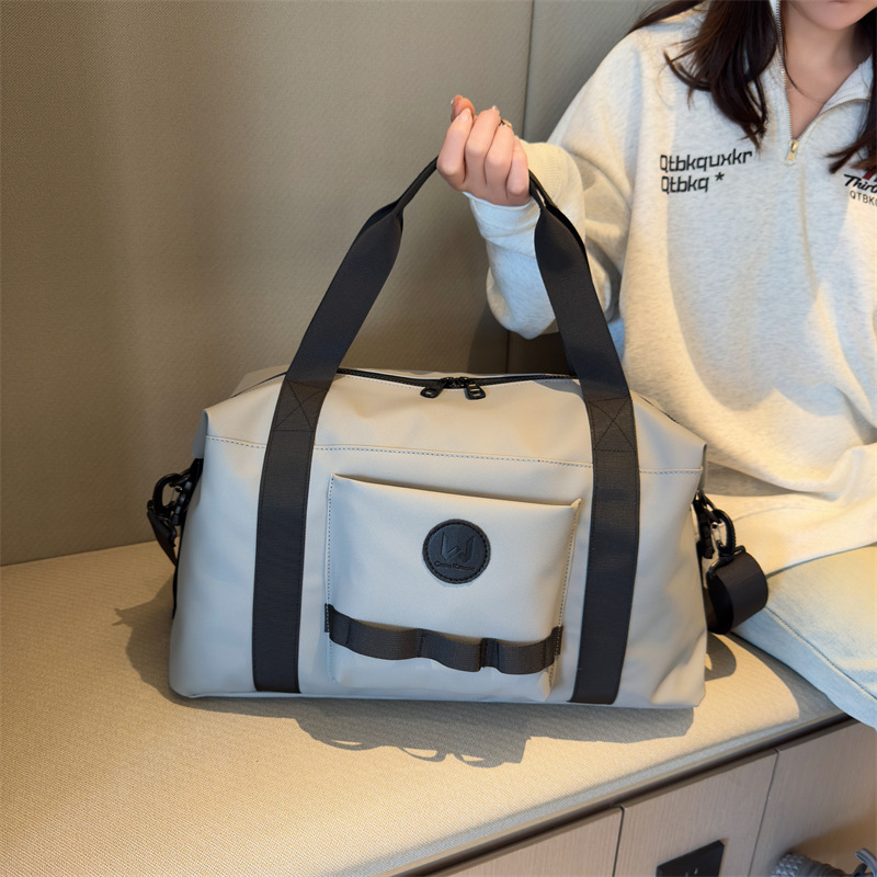 Simple and casual training and fitness bag, short business trip and travel luggage storage bag, large-capacity casual outdoor sports bag full figure