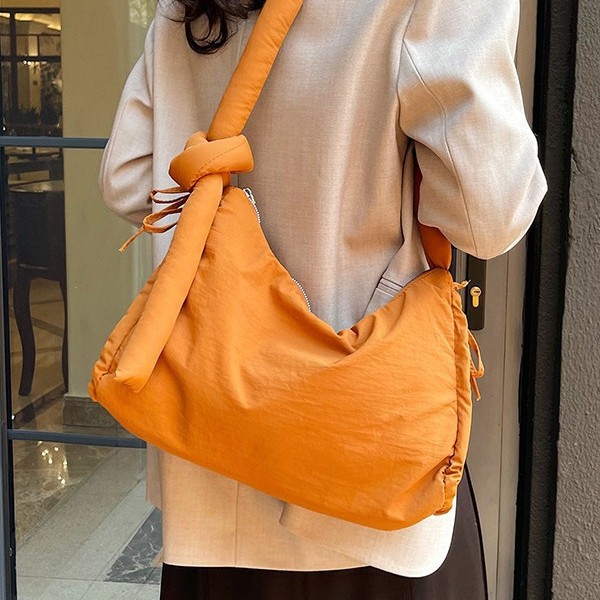 Outdoor sports style large-capacity nylon single-shoulder crossbody bag, retro tie handbag, women's casual solid color underarm bag details Picture