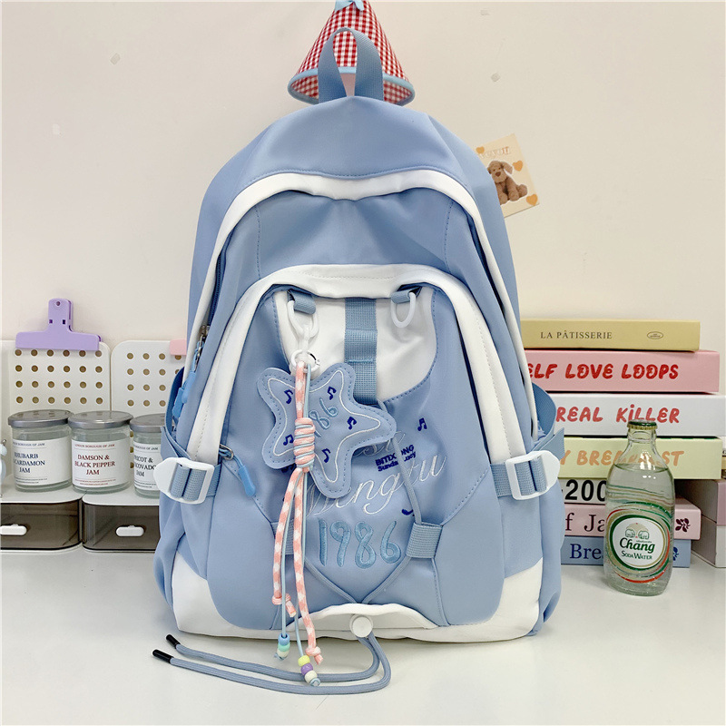 New InS-style student backpack, travel backpack, ultra-light college style, casual and stress-relieving, shouldering the responsibility of college students Application Scenario