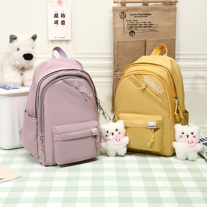 New fashionable and simple children's schoolbags, lightweight and stress-reducing backpack for primary school students, backpack for kindergartens, and travel and study bags full figure