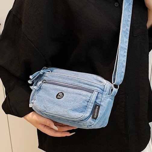 The new spring denim multi-layer fashionable and casual women's bag has sparked a cross-border trend. This single-shoulder crossbody women's bag full figure