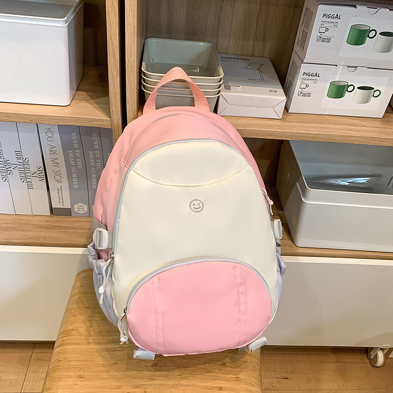 This Korean-style cute backpack is a new and simple schoolbag. It's fashionable, simple, casual and versatile, suitable for both boys and girls to go to school details Picture