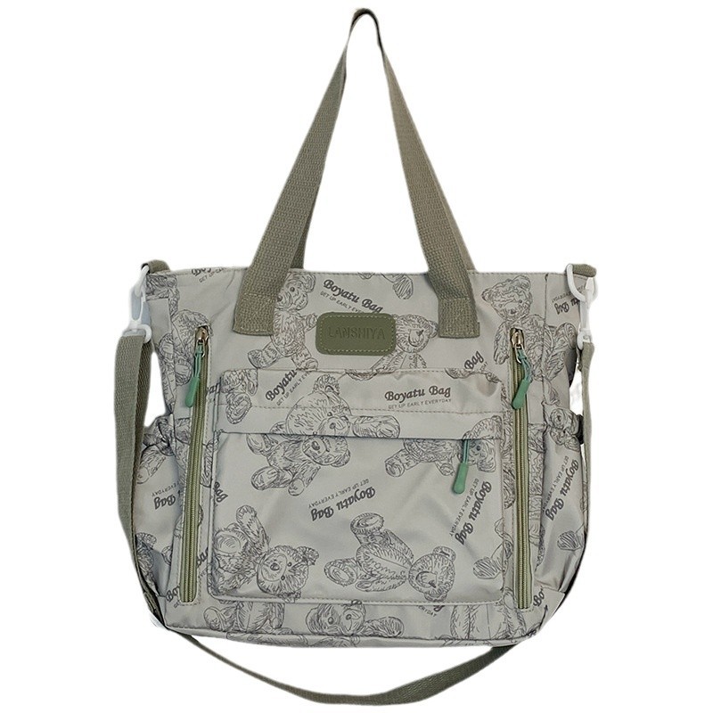 Casual and sweet style printed single-shoulder bag, cartoonish, simple and lightweight single-shoulder, fashionable Japanese waterproof tutorial bag for college students Item Picture
