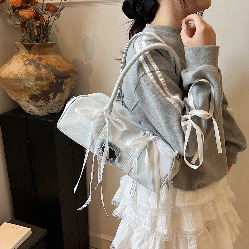 Korean niche and trendy denim baguette bag for women, 2025 new style hand-carried sausage bag, casual and versatile single-shoulder armpit bag details Picture