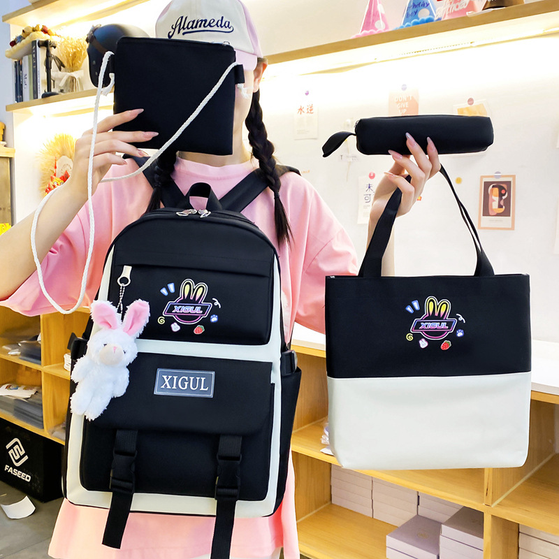 A Korean-style casual backpack for women, a fashionable and trendy high school student backpack set of four pieces, and a large-capacity outdoor travel backpack Specification drawing