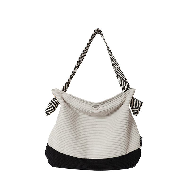 The new Korean-style tote bag for autumn and winter features a contrasting color design, a corduroy single-shoulder bag with a laid-back style and versatile underarm bag Item Picture