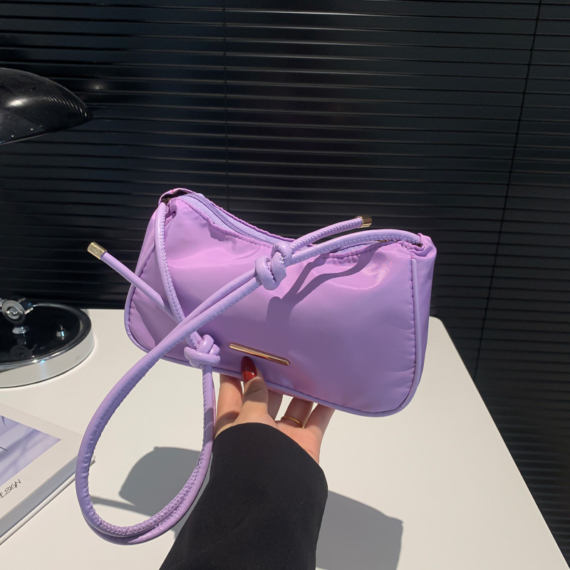 This is a new 2024 high-quality, niche design single-shoulder bag for women, a lightweight nylon fabric bag for the autumn baguette under the armpits full figure