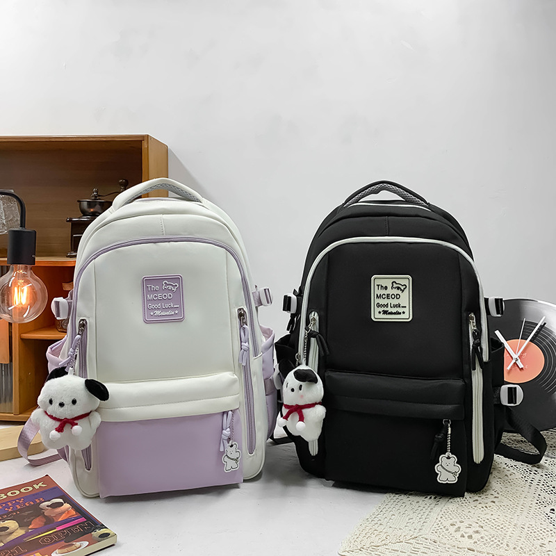 A new cross-border large-capacity schoolbag for primary and secondary school students, a light and simple travel backpack in contrasting colors for girls in grades three to six Specification drawing