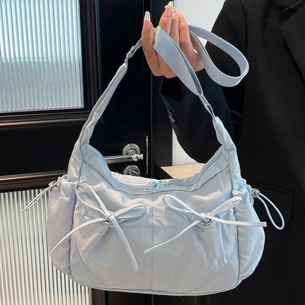 Bow-shaped lightweight nylon fabric bag for women, 2025 new crossbody bag, commuting dumpling bag, college student class bag for women full figure