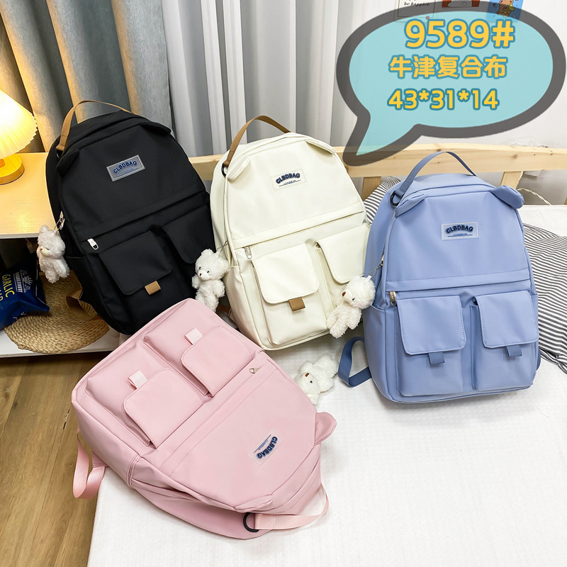 Simple and casual backpack for girls, 2025 new large-capacity Korean style trendy cartoon ear schoolbag for junior and senior high school students full figure