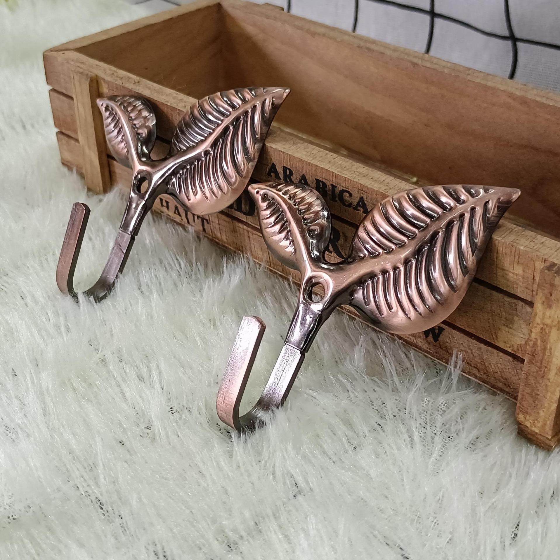 Cross-border best-selling curtain accessories: curtain hooks, curtain wall hooks, European-style leaf hooks, wall hooks, coat hooks, factory direct sales details Picture